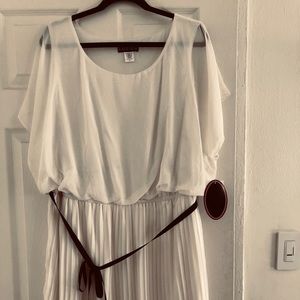 Plus size white blouson pleated dress.